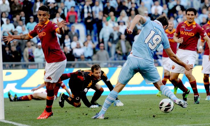 SS Lazio's Senad Lulic (R) scores the 0-1 during the Italian Cup final soccer match between AS Roma and SS Lazio at the Olimpico stadium in Rome, Italy, 26 May 2013.  ANSA/ETTORE FERRARI